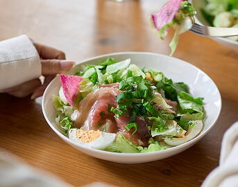 Fresh Garden Salad with Egg and Prosciutto Served at Assisted Living Facility Fresh Garden Salad with Egg and Prosciutto Served at Assisted Living Facility